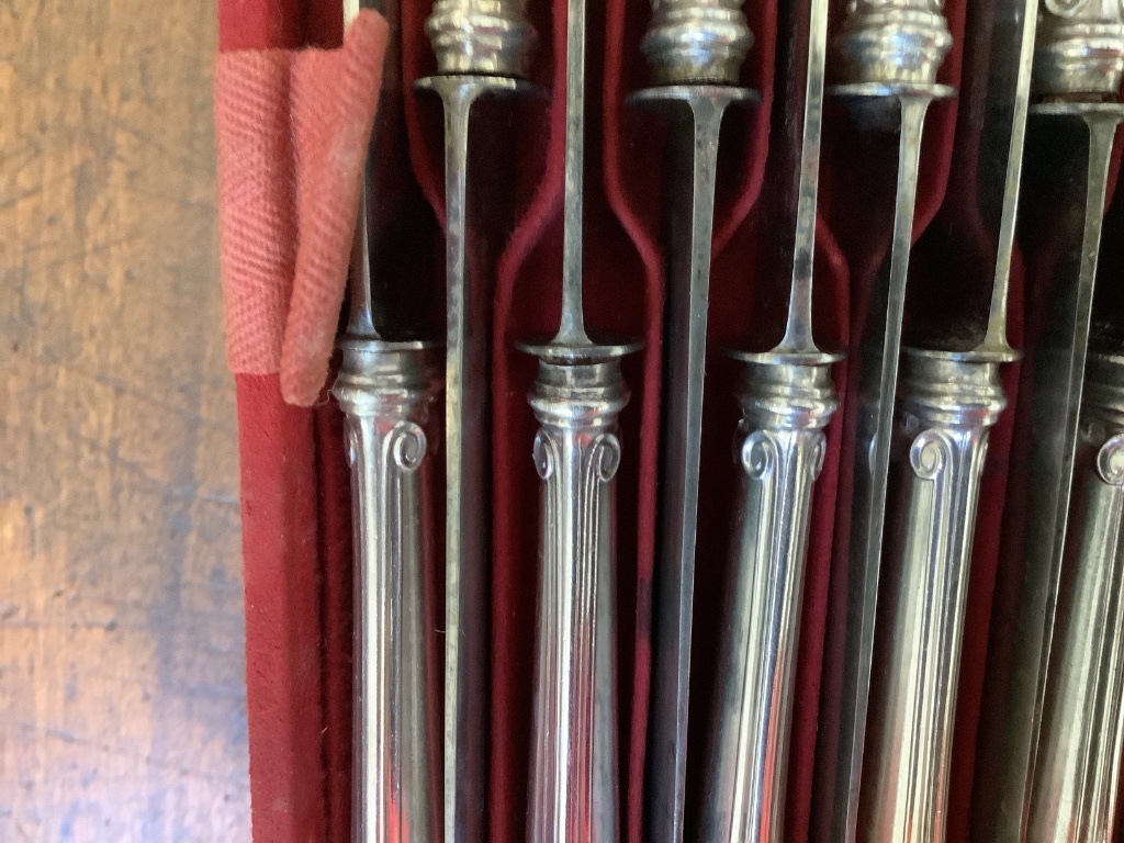 A late 19th century French canteen of silver 950 standard cutlery, in a brass mounted oak canteen, by Prevost Recipon & Cie (Maison Odiot)